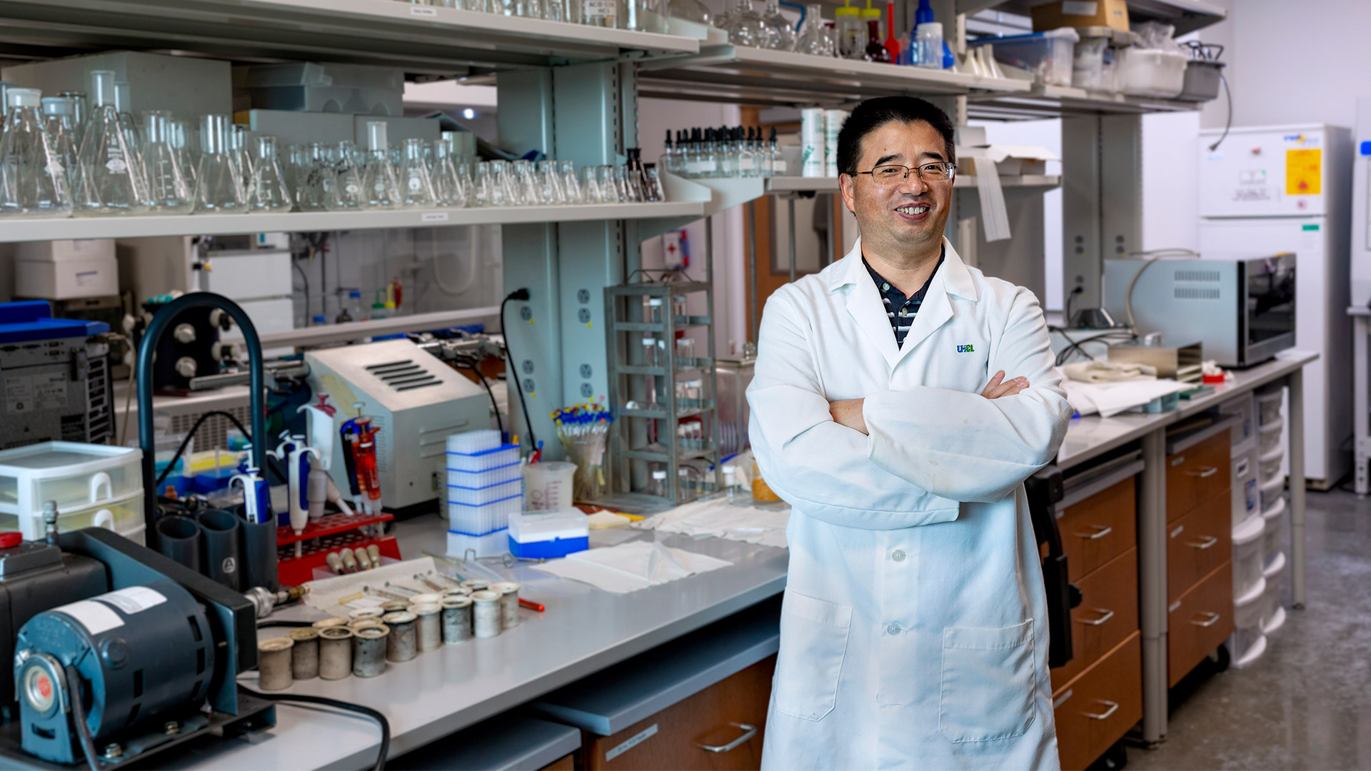 Dr. Daniel Wang in a chemistry laboratory
