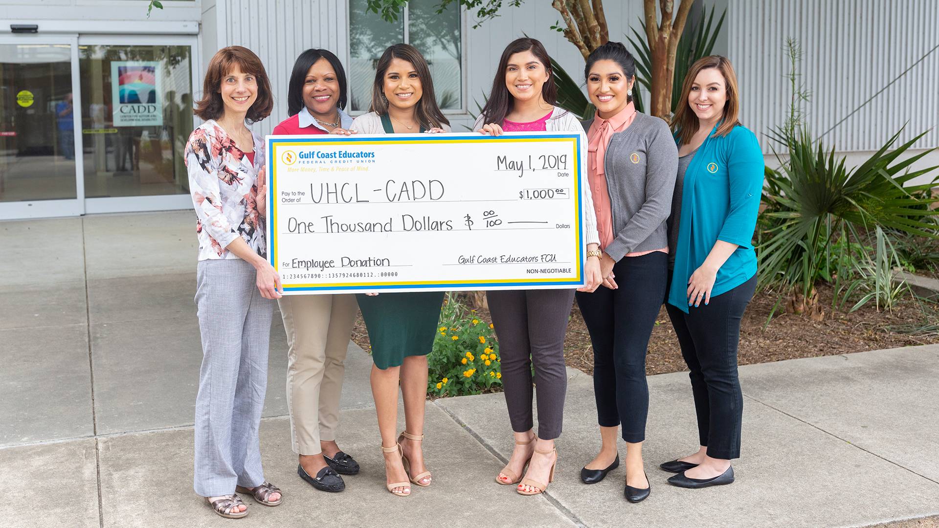 Local credit union continues tradition of giving to UHCL autism center