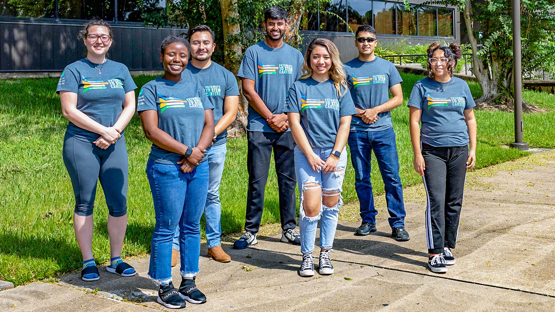 Students gathered on the UHCL campus wearing Pathways to Stem Careers shirts